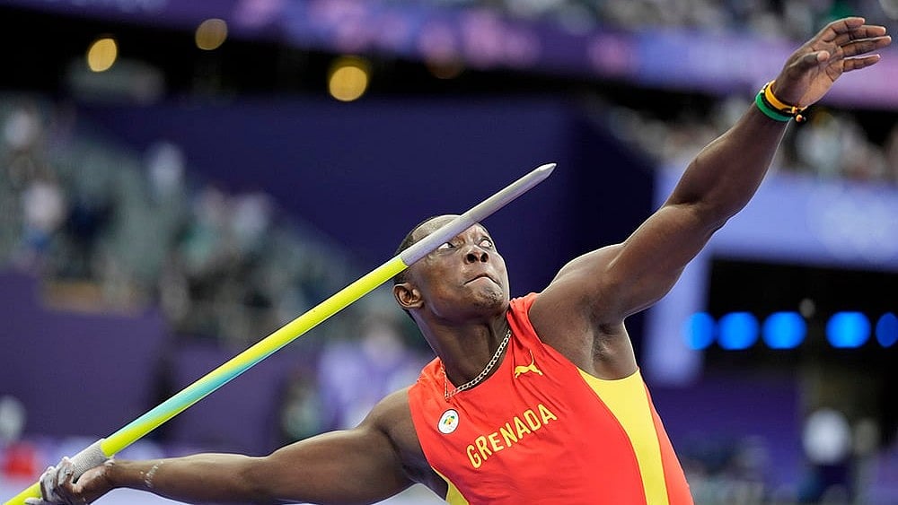 | Photo: AP/Matthias Schrader : Anderson Peters, of Grenada, competes during the men's javelin throw final during Paris Olympics.